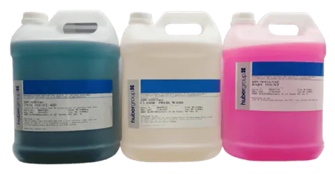 Three cans of printing chemicals