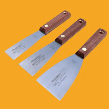 Three ink knives with wooden handles