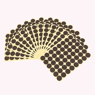 A fan of round sticker label sheets