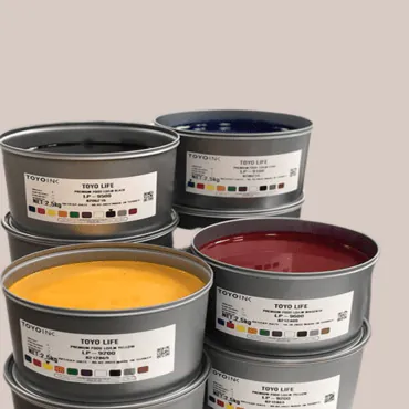 Opened tins of printing ink labelled TOYO LIFE, in yellow, maroon and grey